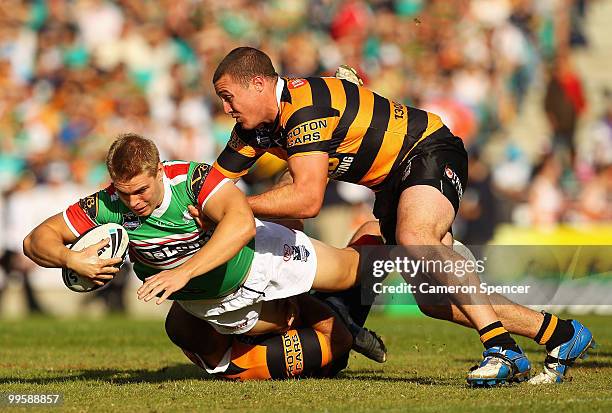 Shannan McPherson of the Rabbitohs is tackled during the round ten NRL match between the Wests Tigers and the South Sydney Rabbitohs at Sydney...