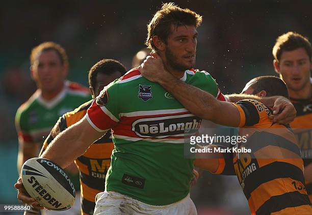 David Taylor of the Rabbitohs looks to pass during the round ten NRL match between the Wests Tigers and the South Sydney Rabbitohs at Sydney Cricket...