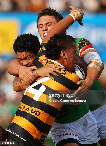 Andrew Fifita of the Tigers is tackled during the round ten NRL match between the Wests Tigers and the South Sydney Rabbitohs at Sydney Cricket...