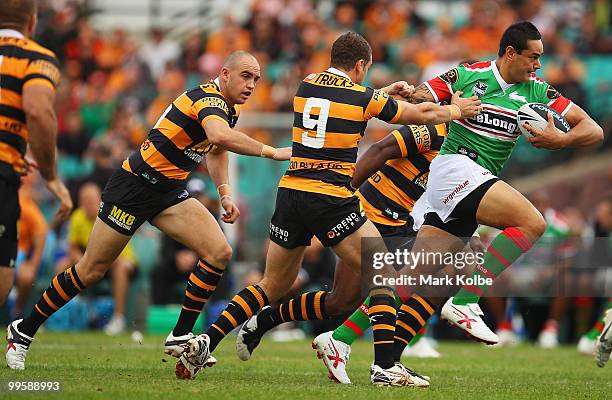 John Sutton of the Rabbitohs runs the ball during the round ten NRL match between the Wests Tigers and the South Sydney Rabbitohs at Sydney Cricket...