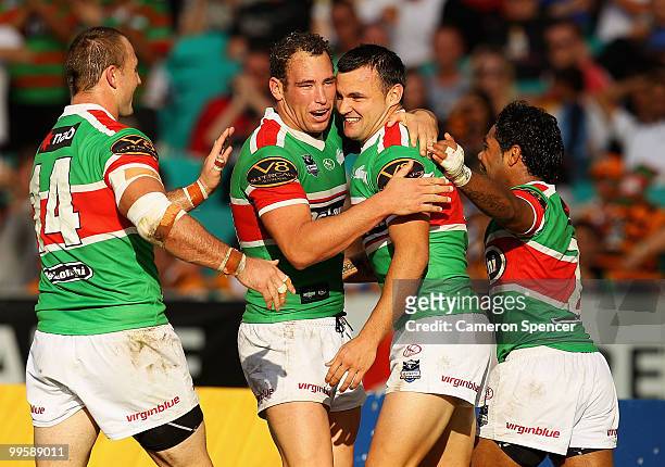 Beau Champion of the Rabbitohs celebrates scoring a try during the round ten NRL match between the Wests Tigers and the South Sydney Rabbitohs at...