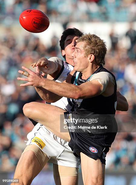 Brett Ebert of the Power and Michael Jamison of the Blues compete for the ball during the round eight AFL match between the Port Adelaide Power and...