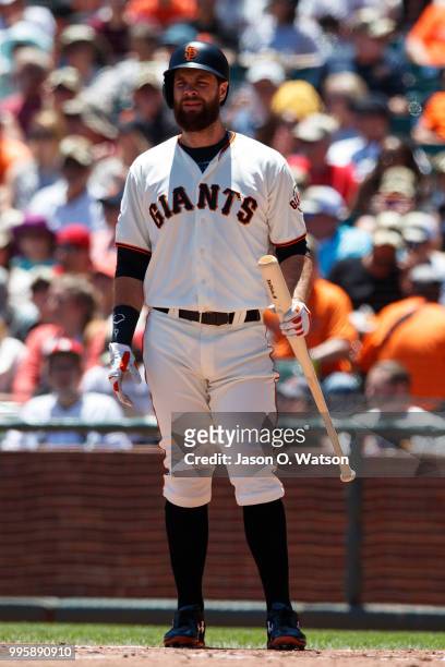Brandon Belt of the San Francisco Giants at bat against the St. Louis Cardinals during the first inning at AT&T Park on July 8, 2018 in San...