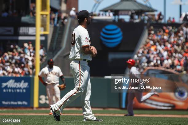 Yairo Munoz of the St. Louis Cardinals rounds the bases after hitting a home run off of Madison Bumgarner of the San Francisco Giants during the...