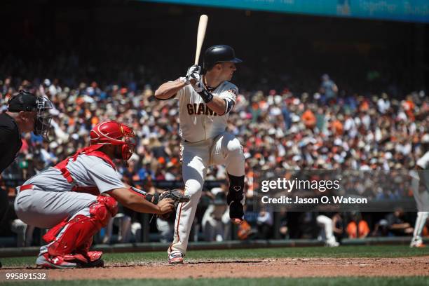 Buster Posey of the San Francisco Giants at bat against the St. Louis Cardinals during the third inning at AT&T Park on July 8, 2018 in San...