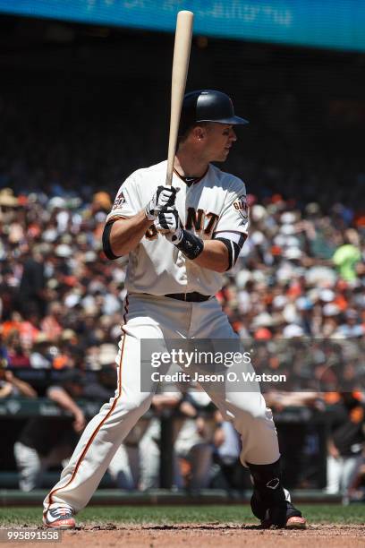 Buster Posey of the San Francisco Giants at bat against the St. Louis Cardinals during the third inning at AT&T Park on July 8, 2018 in San...