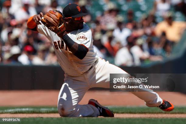 Pablo Sandoval of the San Francisco Giants throws to second base after fielding a ground ball hit off the bat of Marcell Ozuna of the St. Louis...