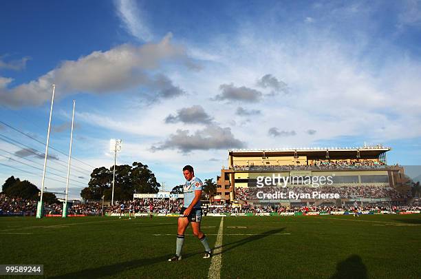 Grant Millington of the Sharks looks dejected after the Panthers scored another try during the round ten NRL match between the Cronulla Sharks and...