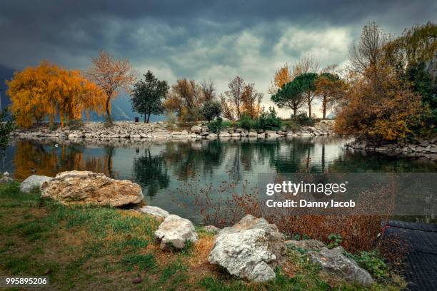 autumn in riva del garda , italy - riva del lago - fotografias e filmes do acervo