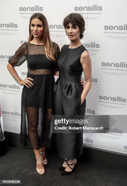 Melissa Jimenez and Paz Vega poses during a photocall for Sensilis at the secret garden inside Joieria Rabat on July 5, 2018 in Barcelona, Spain.