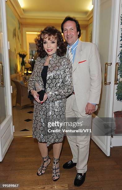 Actress Joan Collins and Percy Gibson attend the Vanity Fair and Gucci Party Honoring Martin Scorsese during the 63rd Annual Cannes Film Festival at...