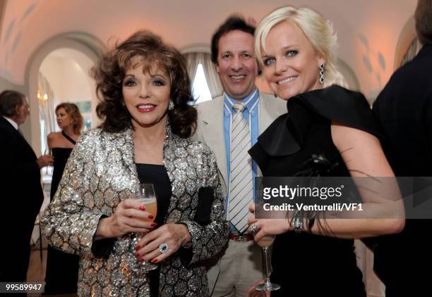 Actress Joan Collins, Percy Gibson and Barbara Sturm attend the Vanity Fair and Gucci Party Honoring Martin Scorsese during the 63rd Annual Cannes...