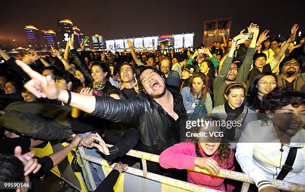 Fans cheer for the performance of Mexican band Cafe Tacuba which regarded as the most important rock bands in Mexico, at Jiangnan Square of Expo Puxi...