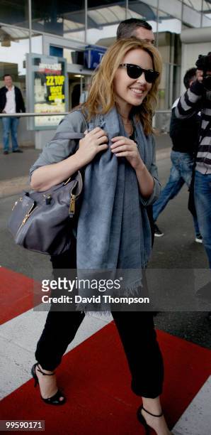 Kylie Minogue arrives at the airport on May 15, 2010 in Nice, France.