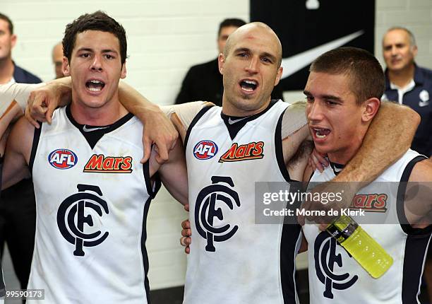 Carlton players celebrate in the changerooms after winning the game during the round eight AFL match between the Port Adelaide Power and the Carlton...
