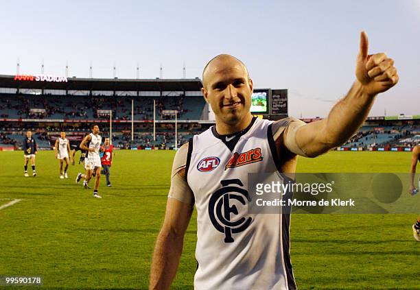 Chris Judd of the Blues celebrate after the game during the round eight AFL match between the Port Adelaide Power and the Carlton Blues at AAMI...