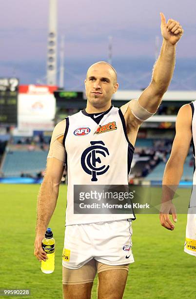 Chris Judd of the Blues celebrate after the game during the round eight AFL match between the Port Adelaide Power and the Carlton Blues at AAMI...