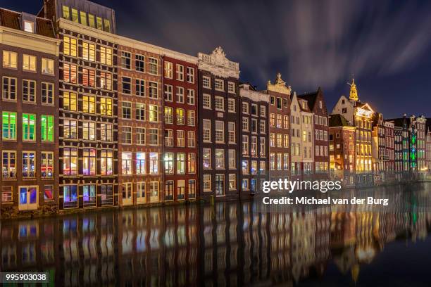 damrak amsterdam - burg stock pictures, royalty-free photos & images