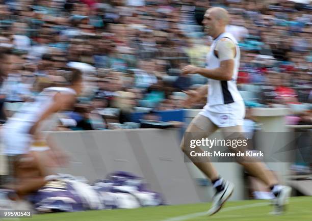 Chris Judd of the Blues runs to the interchange during the round eight AFL match between the Port Adelaide Power and the Carlton Blues at AAMI...