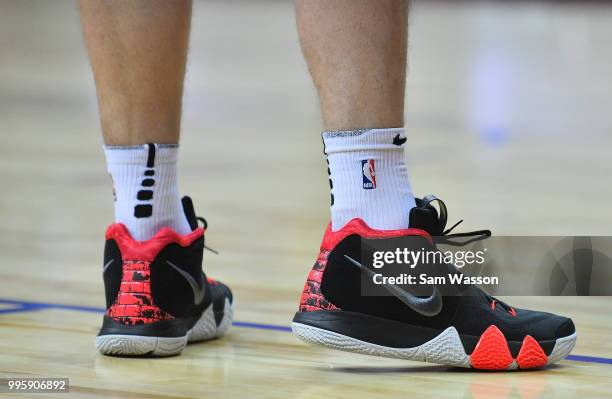Drew Eubanks of the San Antonio Spurs, shoe detail, stands on the court during his team's game against the Washington Wizards during the 2018 NBA...