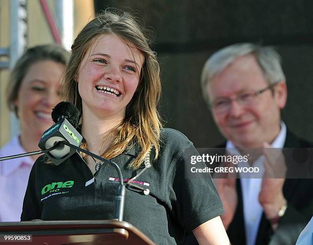 Australian round-the-world sailor, Jessica Watson , age 16, with Australian prime Minister Kevin Rudd , reacts to spectators as she is interviewed on...