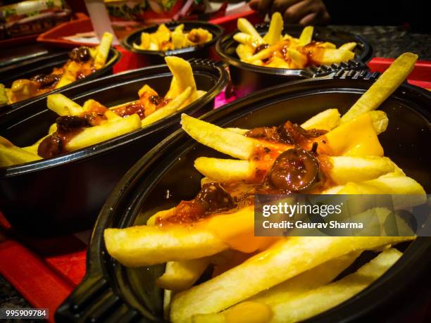 yummy french fries - yummy stock pictures, royalty-free photos & images