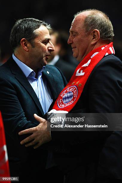 Manager Klaus Allofs of Bremen and president Uli Hoeness of Bayern talk to each other the DFB Cup final match between SV Werder Bremen and FC Bayern...