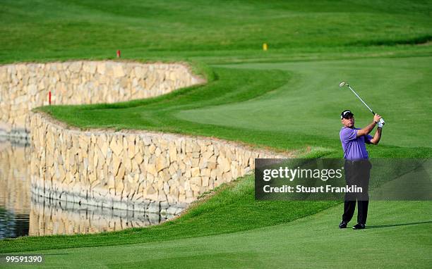 Hennie Otto of South Africa plays his approach shot on the fifth hole during the final round of the Open Cala Millor Mallorca at Pula golf club on...