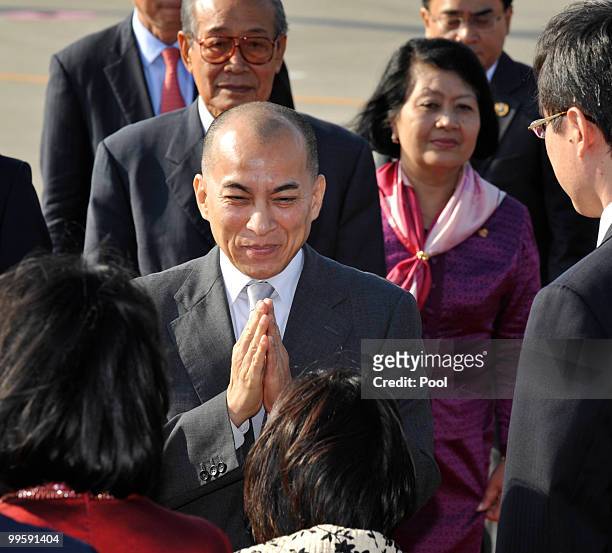 Cambodian King Norodom Sihamoni is welcomed by wellwishers upon his arrival at Tokyo's Haneda Airport on May 16, 2010 in Tokyo, Japan. Sihamoni, on...