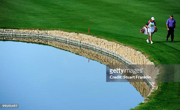 Hennie Otto of South Africa and caddie on the fifth hole during the final round of the Open Cala Millor Mallorca at Pula golf club on May 16, 2010 in...