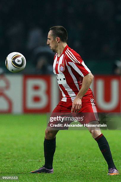 Franck Ribery runs with the ball during the DFB Cup final match between SV Werder Bremen and FC Bayern Muenchen at Olympic Stadium on May 15, 2010 in...
