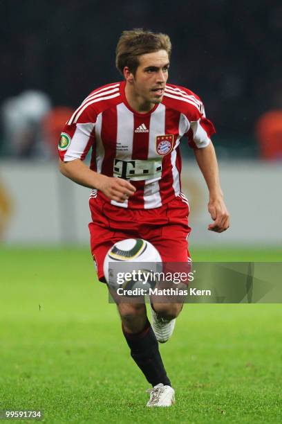 Philipp Lahm of Bayern runs with the ball during the DFB Cup final match between SV Werder Bremen and FC Bayern Muenchen at Olympic Stadium on May...