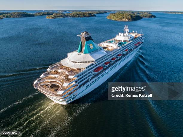 artania cruiser ship passing by in the stockholm swedish archipelago - remus kotsell stock pictures, royalty-free photos & images
