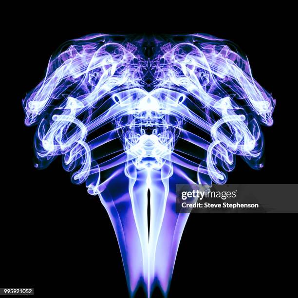 smoke ram-purple and white on black. - zodiac fire sign stock pictures, royalty-free photos & images
