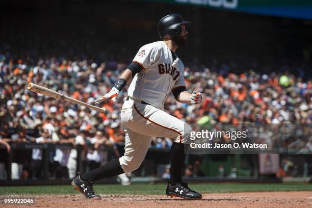 Brandon Belt of the San Francisco Giants hits a double against the St. Louis Cardinals during the fifth inning at AT&T Park on July 8, 2018 in San...