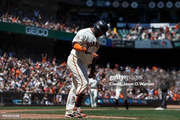 Pablo Sandoval of the San Francisco Giants flips his bat after hitting a three run home run against the St. Louis Cardinals during the fifth inning...