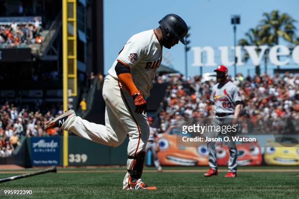 Pablo Sandoval of the San Francisco Giants rounds the bases after hitting a three run home run off of John Brebbia of the St. Louis Cardinals during...