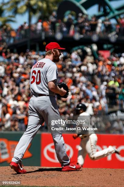 Pablo Sandoval of the San Francisco Giants rounds the bases after hitting a three run home run off of John Brebbia of the St. Louis Cardinals during...