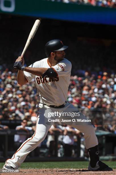 Madison Bumgarner of the San Francisco Giants at bat against the St. Louis Cardinals during the fifth inning at AT&T Park on July 8, 2018 in San...