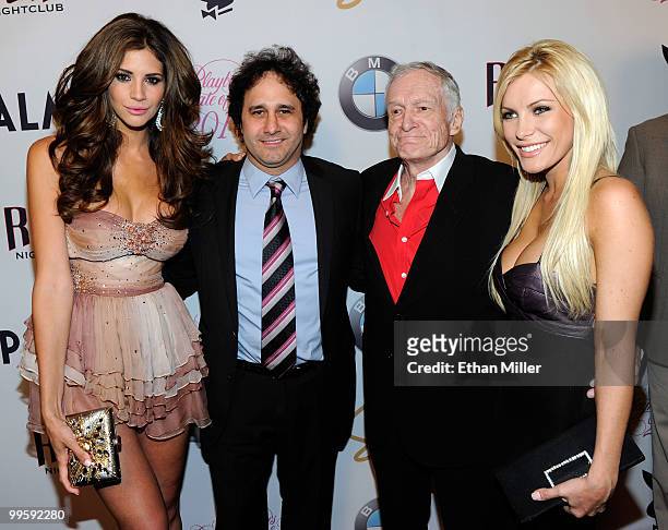 Model Hope Dworaczyk, Palms Casino Resort President George Maloof, Playboy founder Hugh Hefner and his girlfriend, December 2009 Playboy Playmate of...
