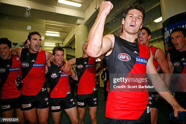 Bombers players celebrate in their dressing room after the round eight AFL match between the St Kilda Saints and the Essendon Bombers at Etihad...