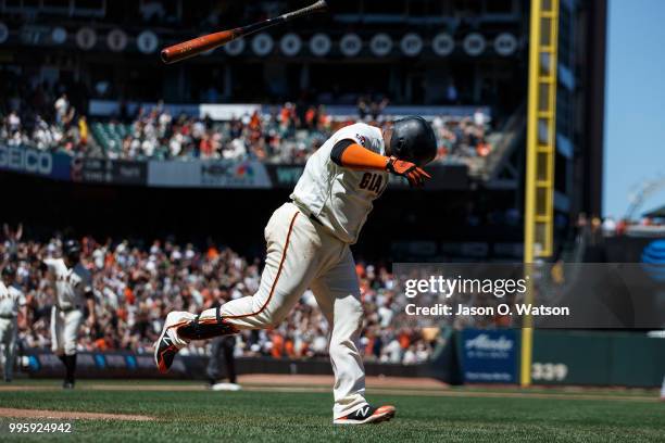 Pablo Sandoval of the San Francisco Giants flips his bat after hitting a three run home run against the St. Louis Cardinals during the fifth inning...
