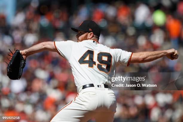 Sam Dyson of the San Francisco Giants pitches against the St. Louis Cardinals during the seventh inning at AT&T Park on July 8, 2018 in San...