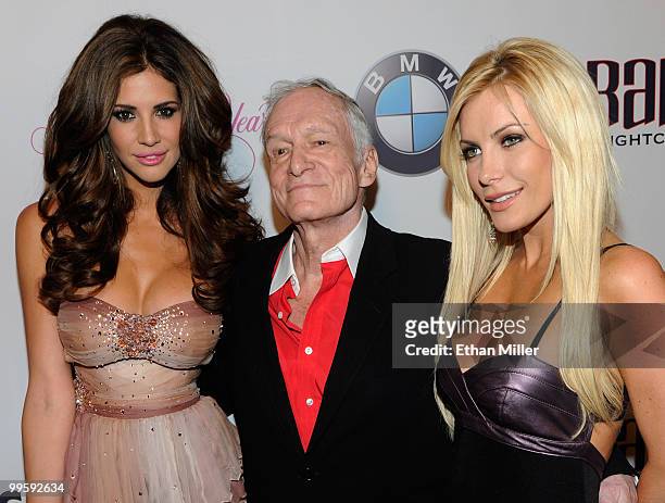 Model Hope Dworaczyk, Playboy founder Hugh Hefner and his girlfriend, December 2009 Playboy Playmate of the Month Crystal Harris, arrive at a party...
