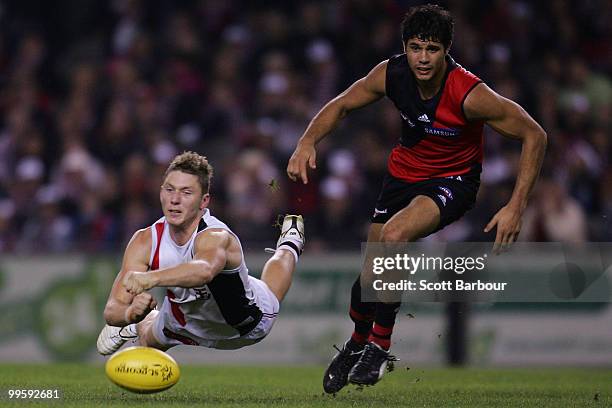 Zac Dawson of the Saints and Patrick Ryder of the Bombers compete for the ball during the round eight AFL match between the St Kilda Saints and the...