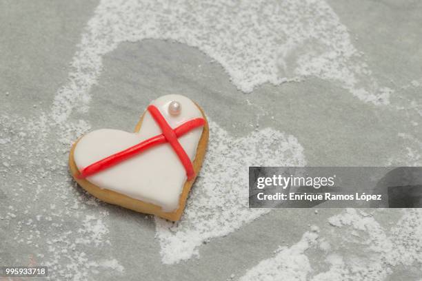 baked valentine's heart with white and red icing - animal internal organ stock pictures, royalty-free photos & images