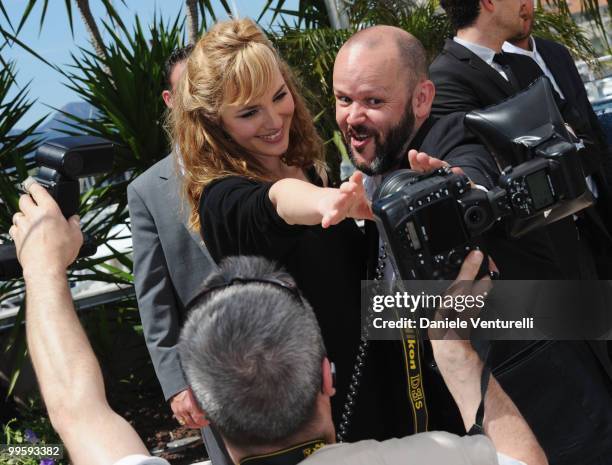 Actress Louise Bourgoin and Director Gilles Marchand pose for photographs as they attend the 'Black Heaven' Photo Call held at the Palais des...