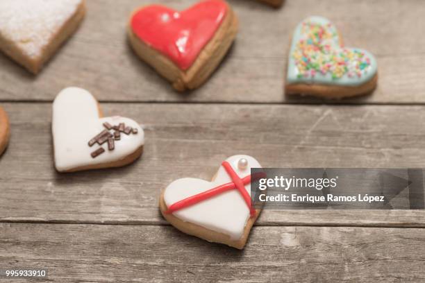 several delicious cookies with icing - coração de animal imagens e fotografias de stock