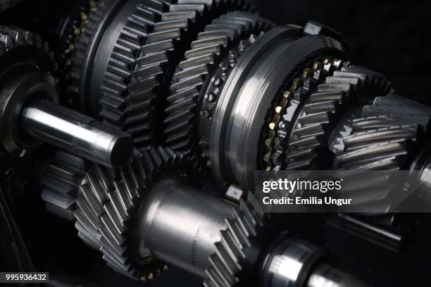 cogs and gears - emilia stock pictures, royalty-free photos & images