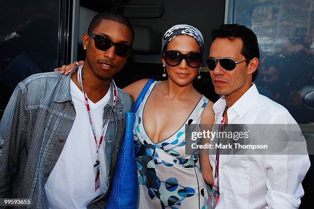 Pharrell Williams, Jennifer Lopez and her husband Marc Anthony are seen in the paddock during the Monaco Formula One Grand Prix at the Monte Carlo...